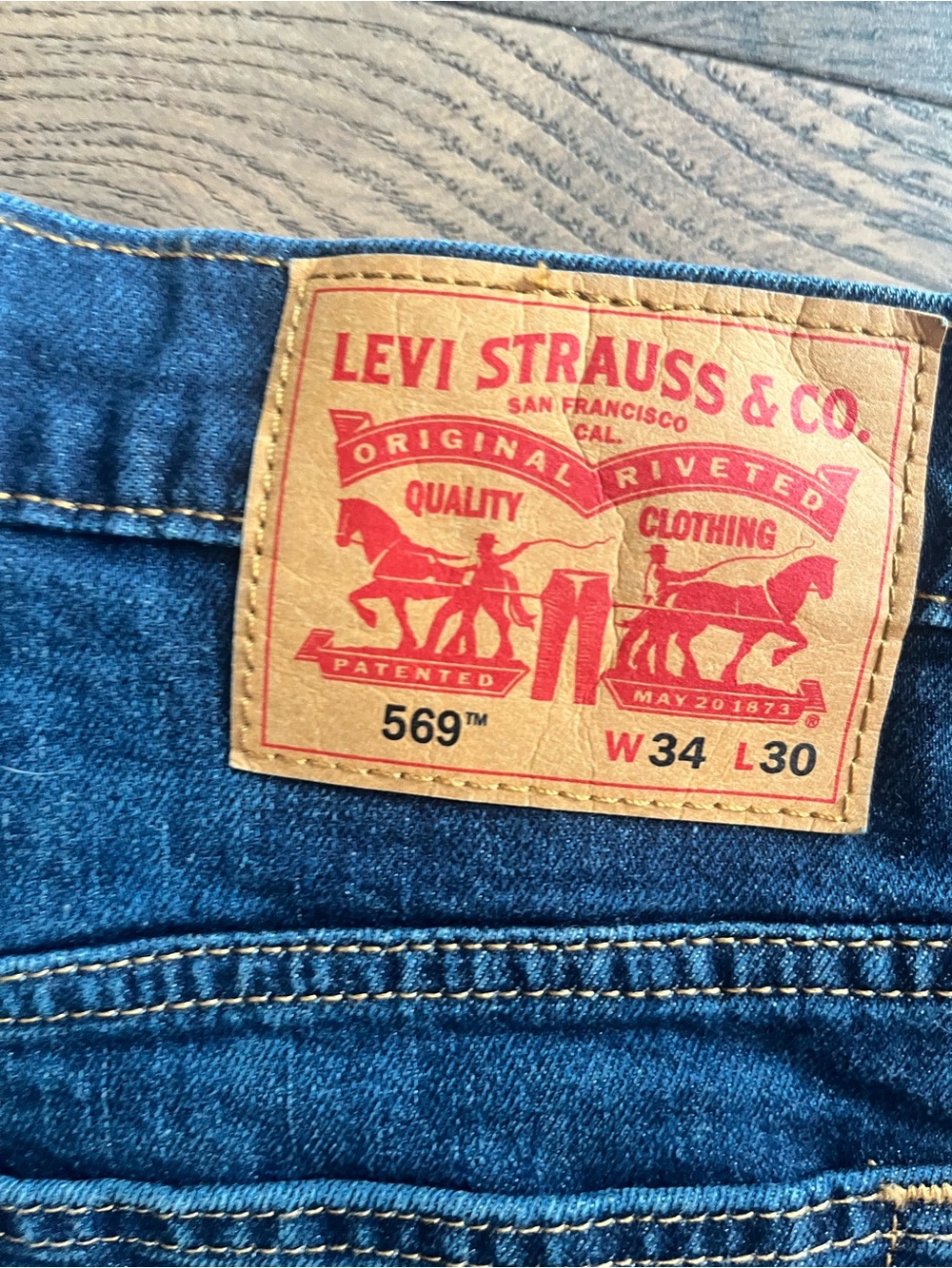 Levi's 569 Relaxed Fit Jeans in Blue with Tan Patch